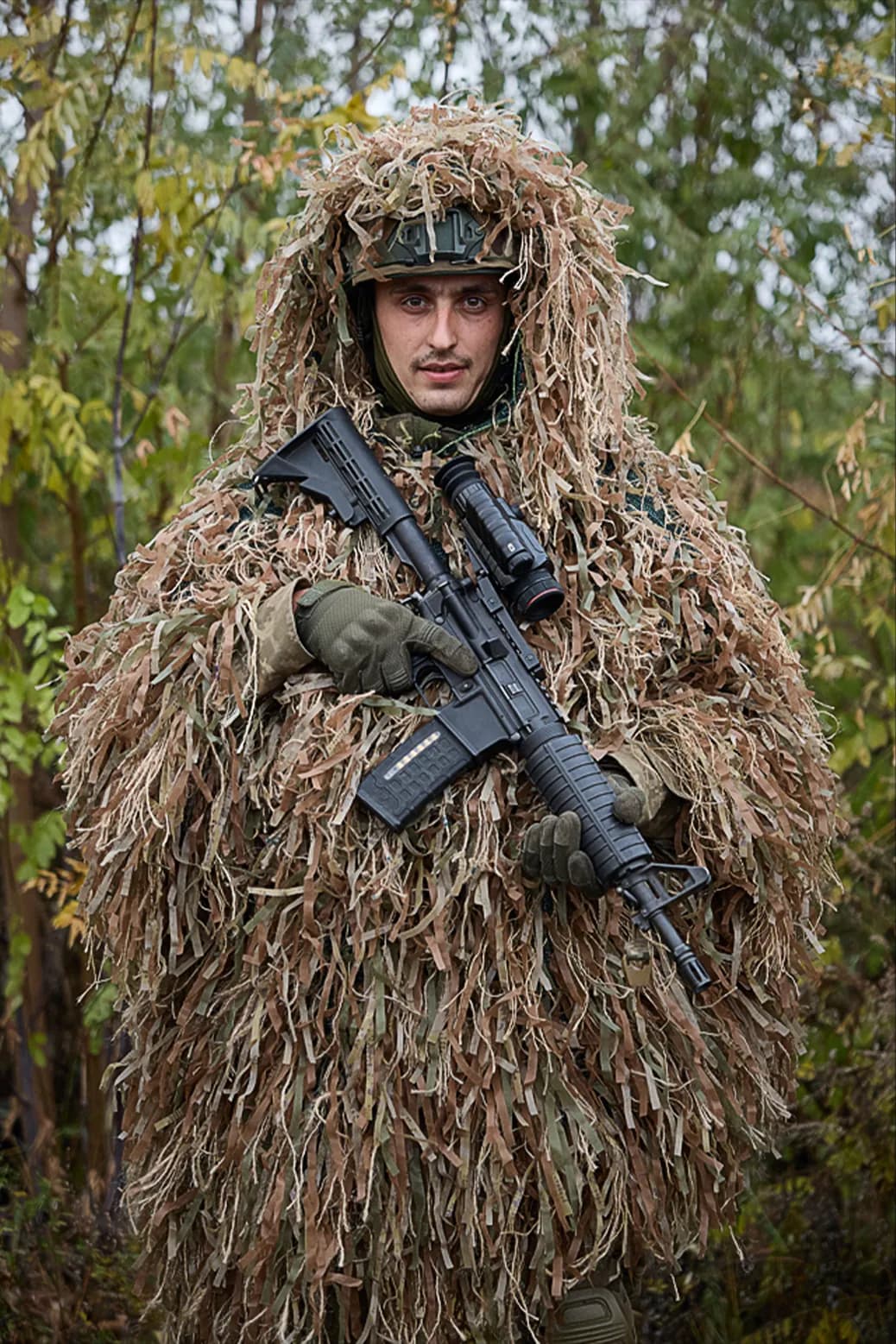 Legion scout in a ghillie suit
