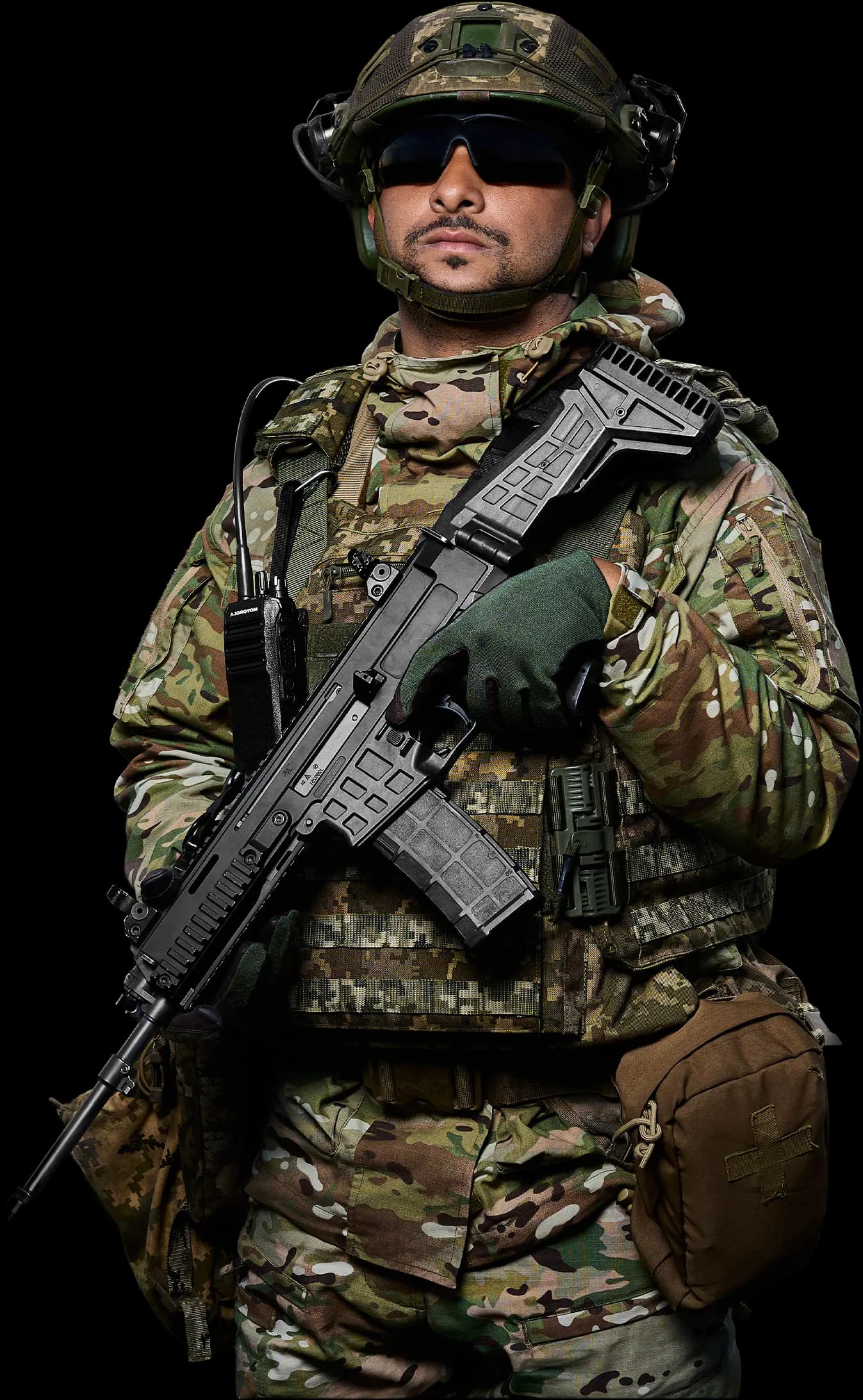 Legion soldier in full kit holding a rifle