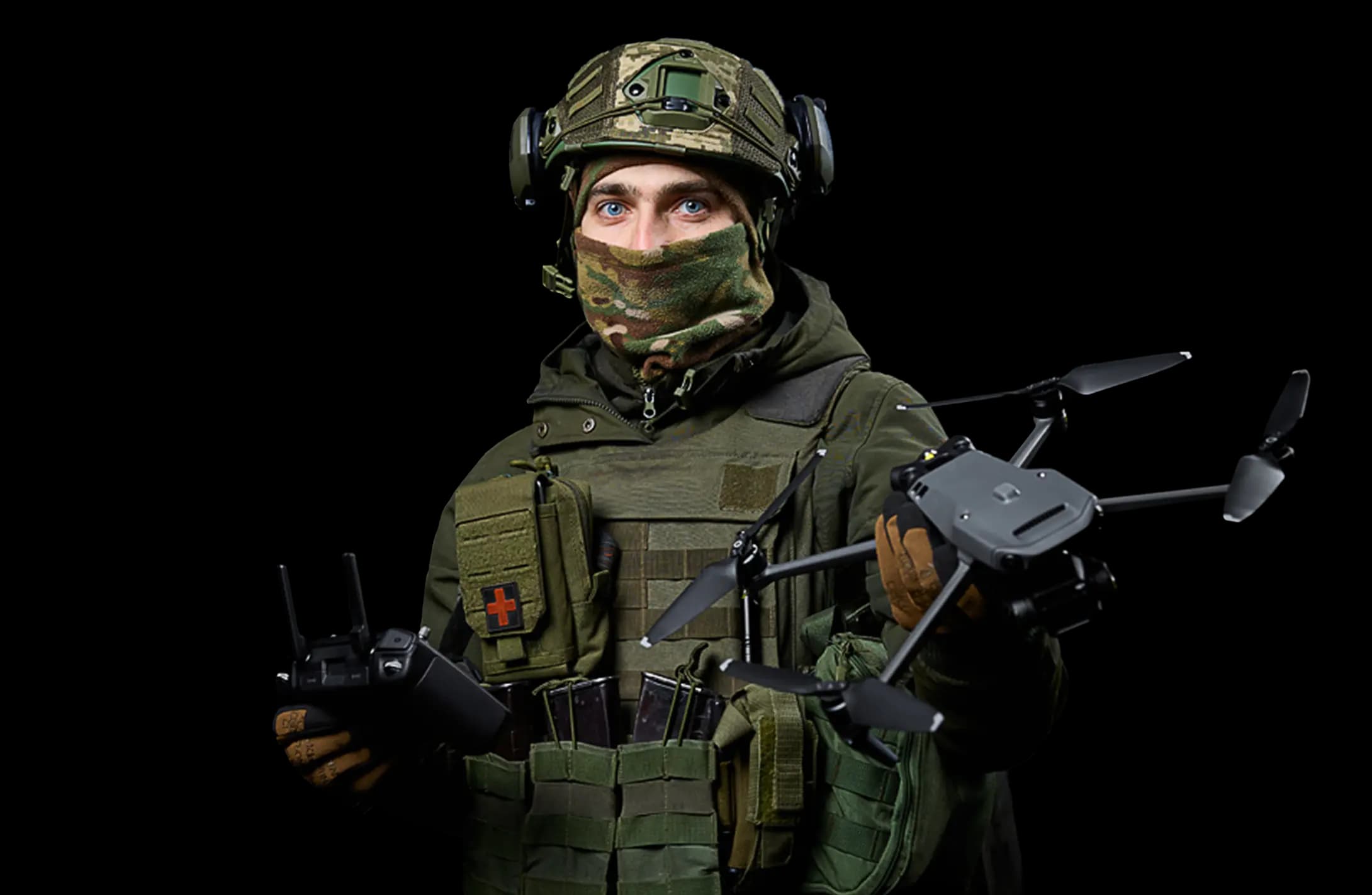 Legion drone operator holding a reconnaissance quadcopter